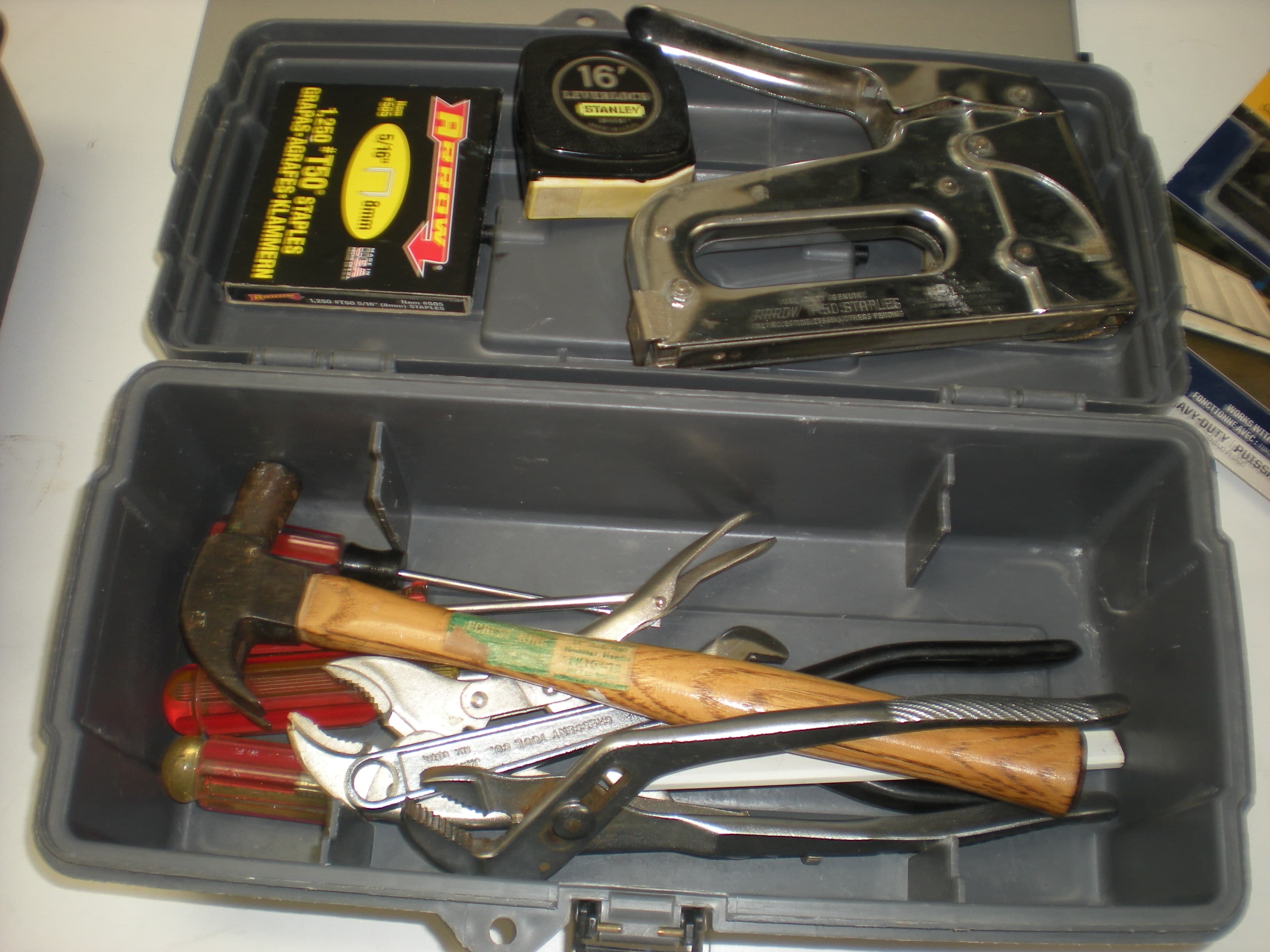 assorted hand tools in tool box